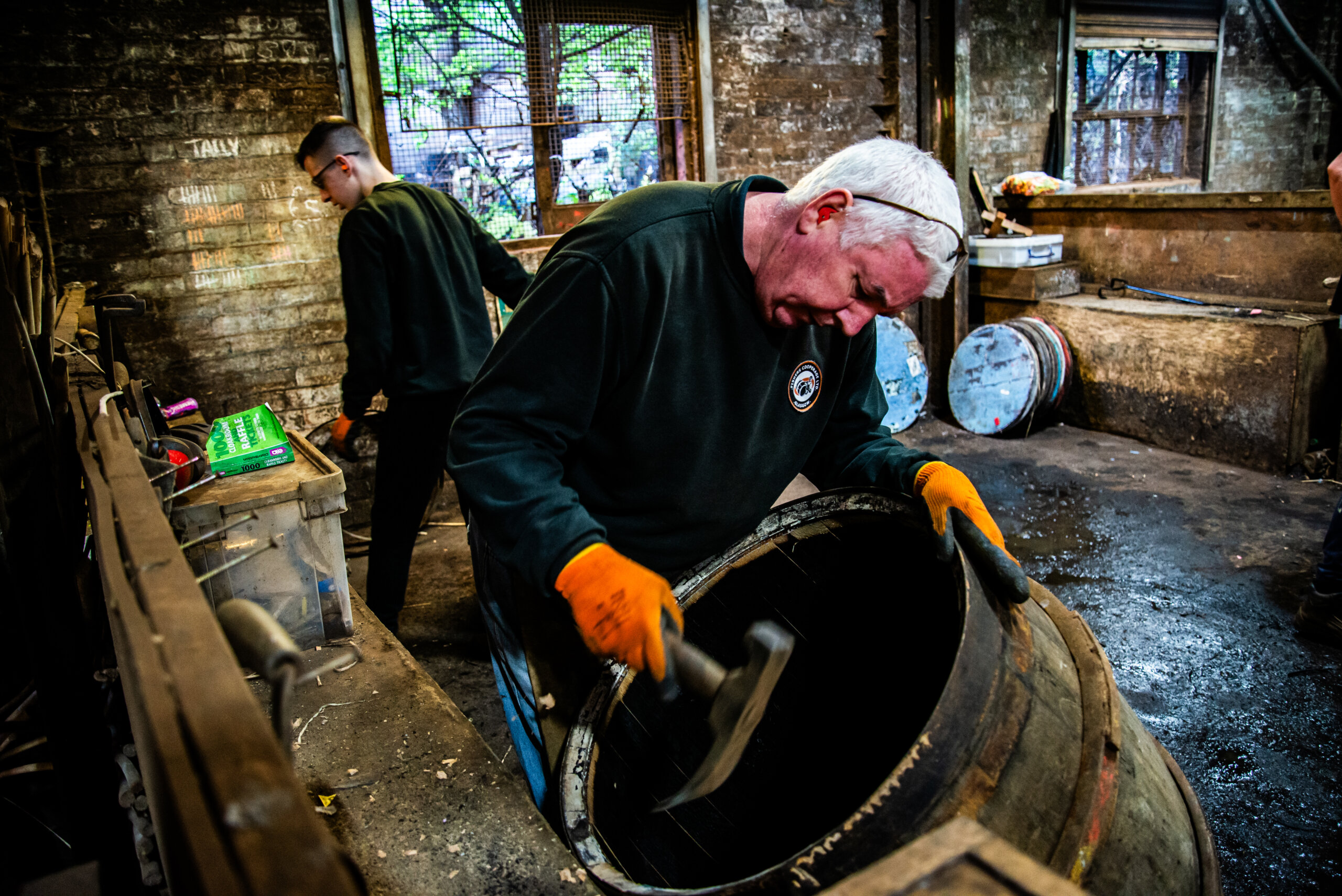 Philip demonstrating cask repair